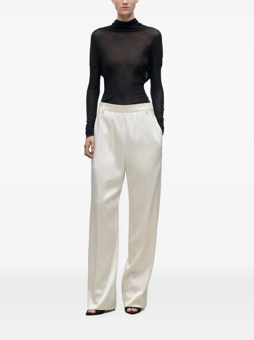 Victoria Beckham Ruimvallende broek met gewelfde pijpen Beige