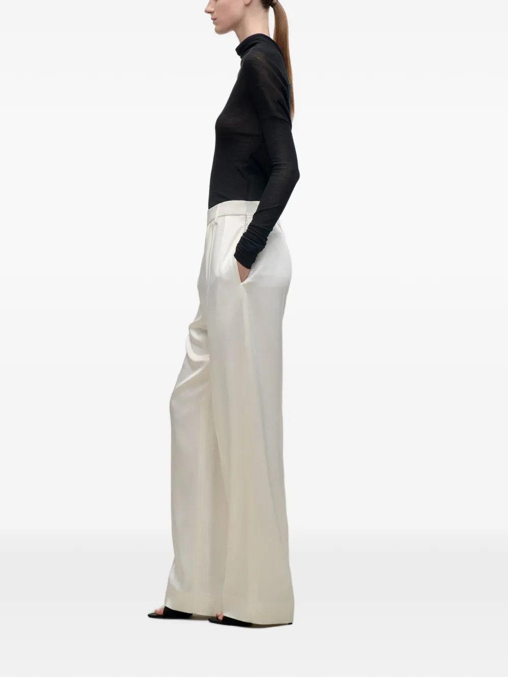 Victoria Beckham Ruimvallende broek met gewelfde pijpen Beige