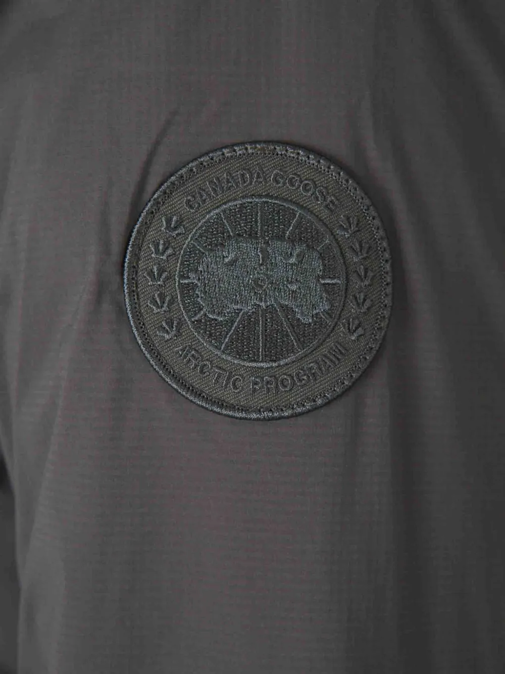 Canada Goose Lodge Track jack met logopatch Grijs