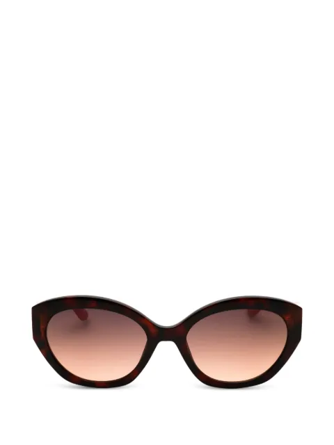 GUESS EYEWEAR tortoiseshell-effect oval-frame sunglasses