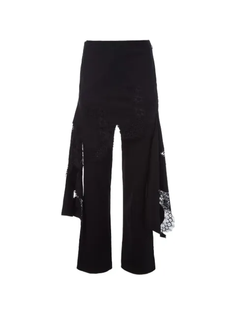 Monse pantalones deconstruidos con dobladillo de encaje