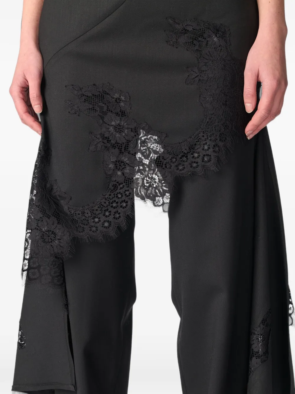 Monse Gedeconstrueerde broek met kanten zoom Zwart