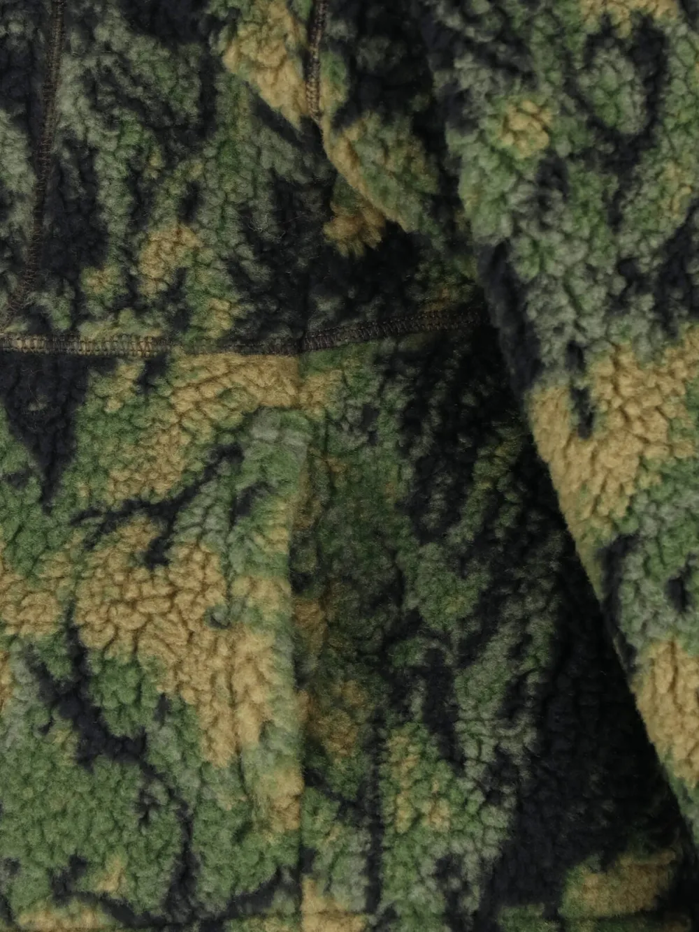 The North Face Jack met fleece-textuur en abstracte print Groen