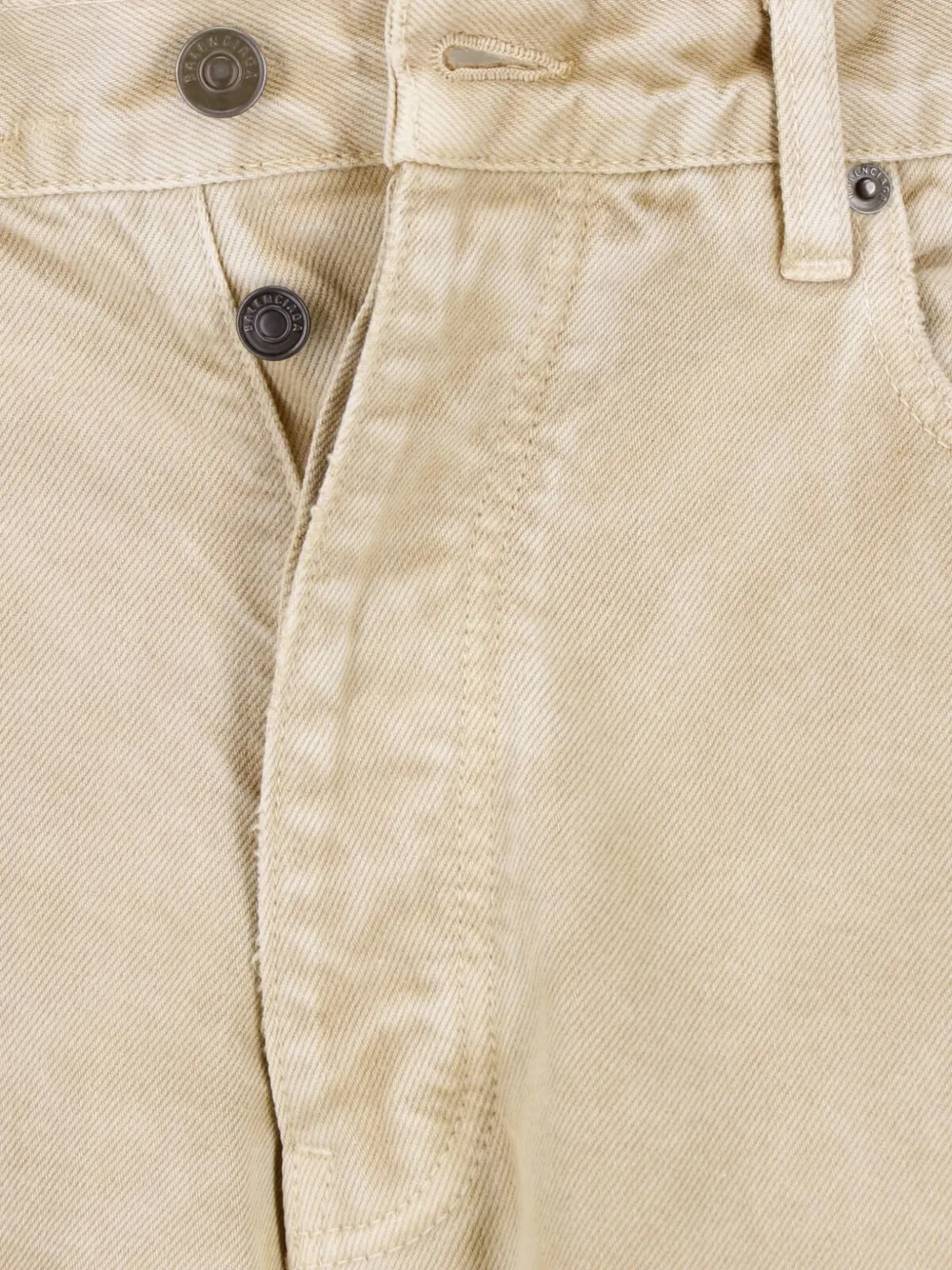 Balenciaga Gerafelde jeans met wijde pijpen en verfspatten print Beige