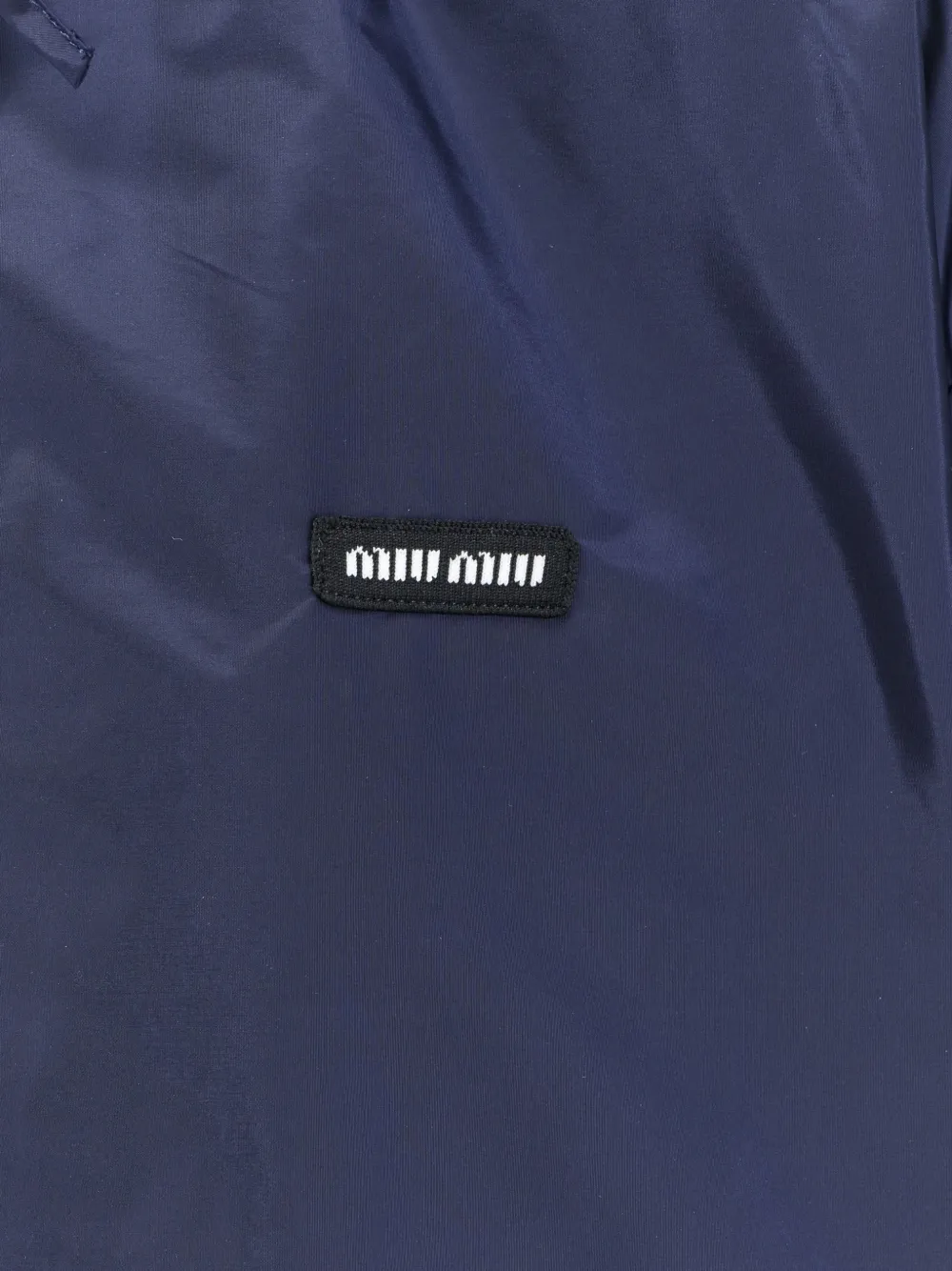 Miu cropped recycled nylon jacket Blauw