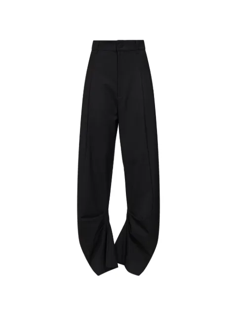 Amen pleated curved-leg trousers