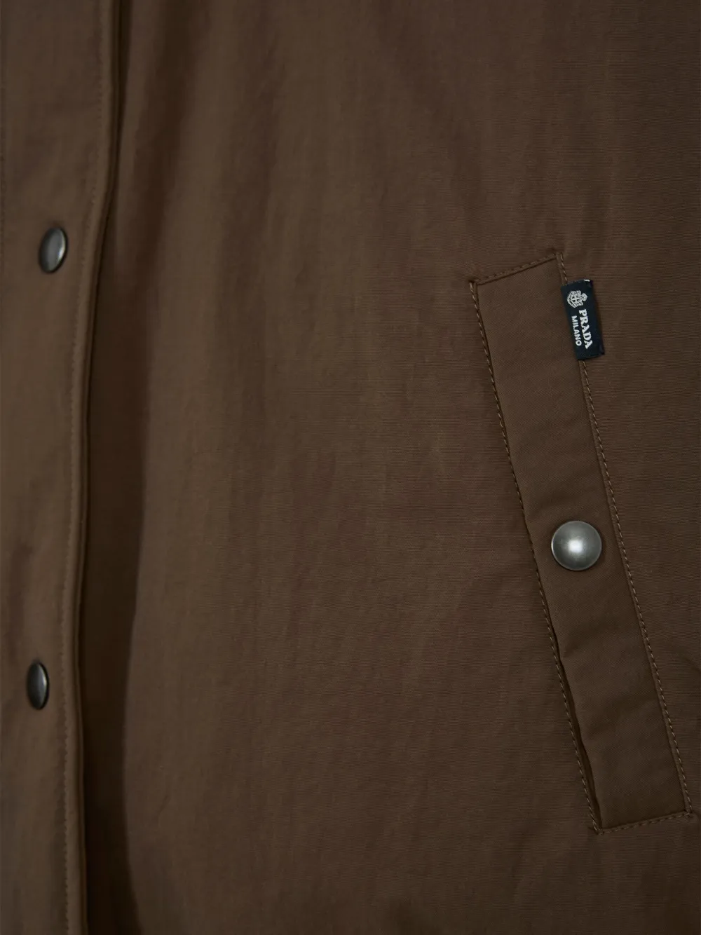 Prada Re-Nylon logo-patch jacket Bruin