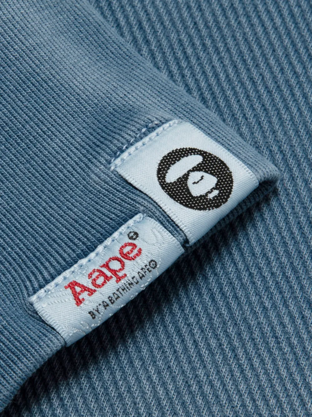 AAPE BY *A BATHING APE denim-patch graffiti-print sweater Blauw