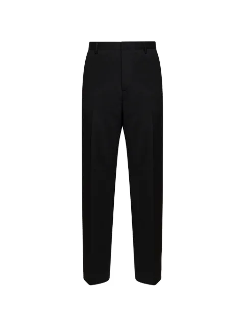Costumein pressed-crease tailored trousers