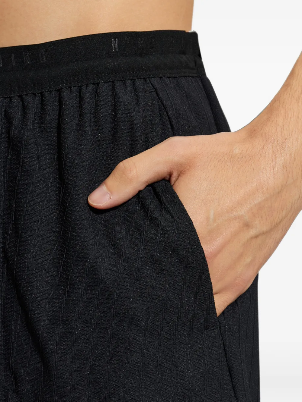 Nike Aero-Fit hardloopshorts met logoprint Zwart