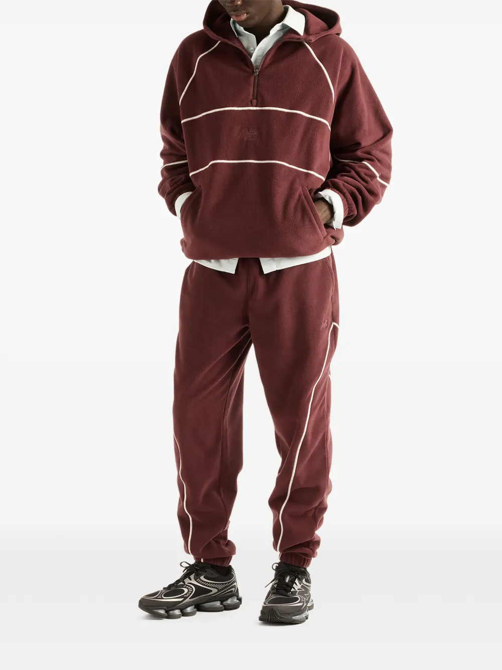 New Balance Trackside Polar Fleece track pants Rood