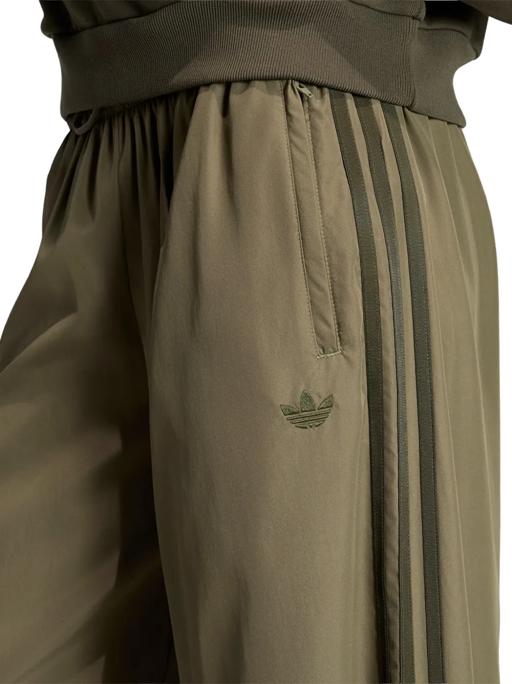 adidas Firebird Adilenium side-stripe track pants Groen