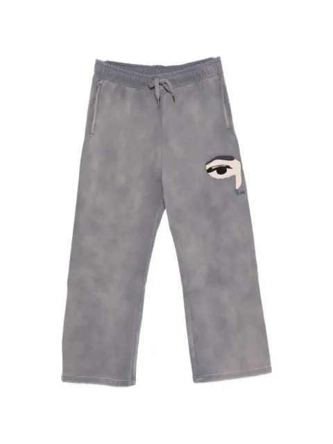 KidSuper face-patch track pants
