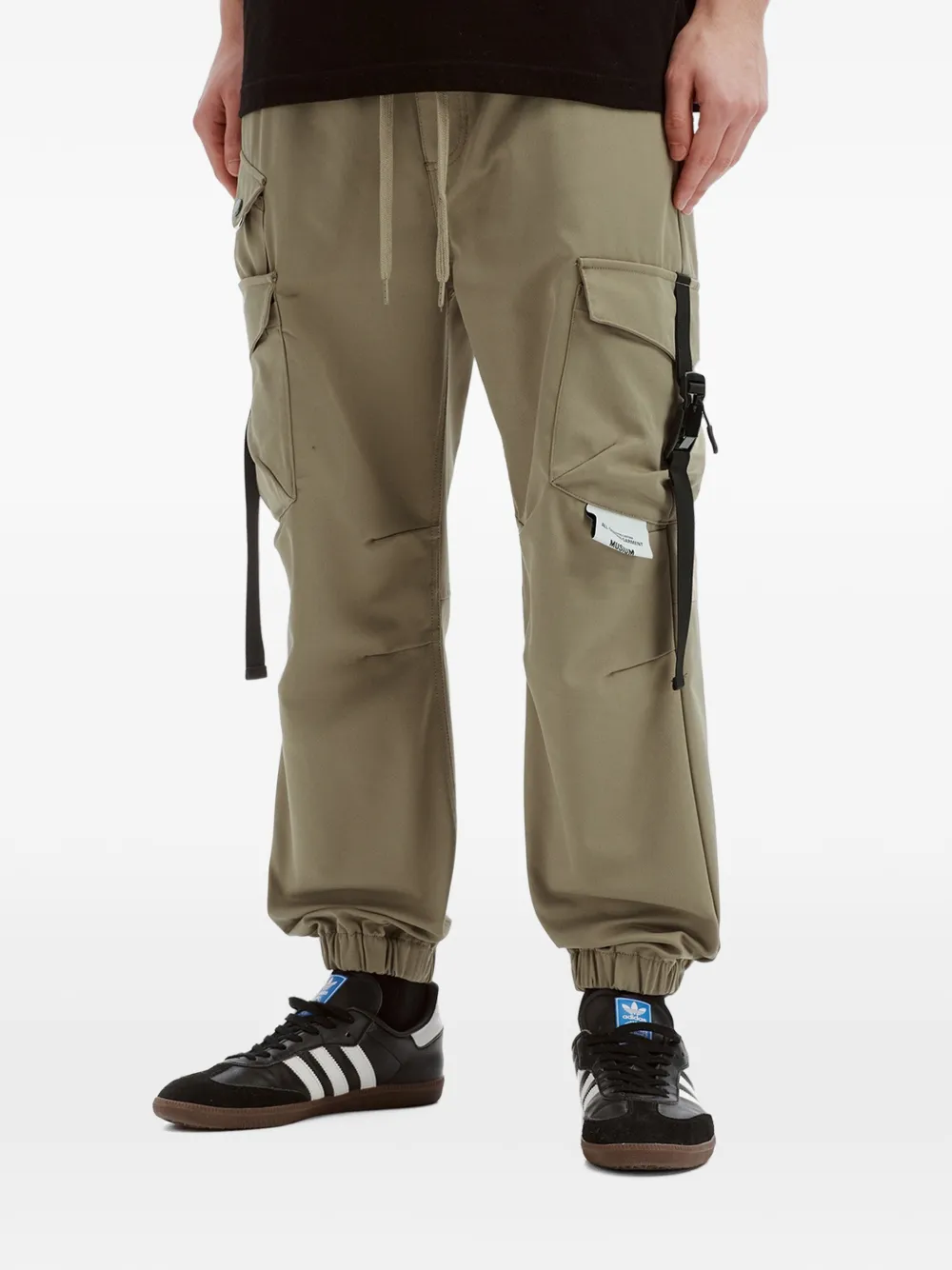 Musium Div. buckle-strap cargo pants Groen