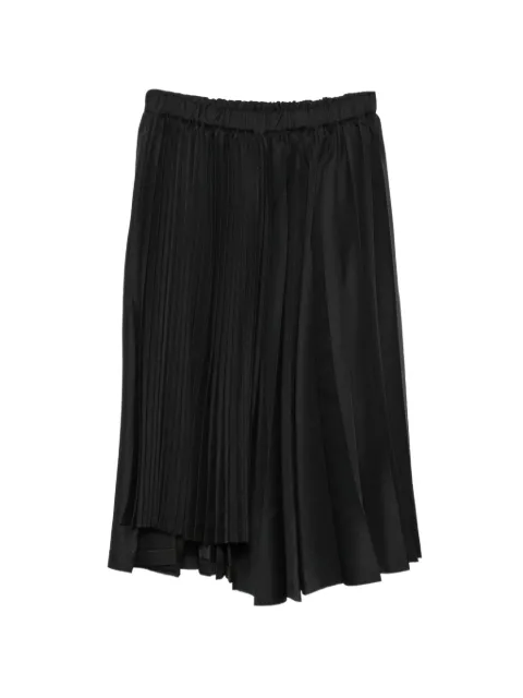 Black Comme Des Garçons pleated asymmetric skirt