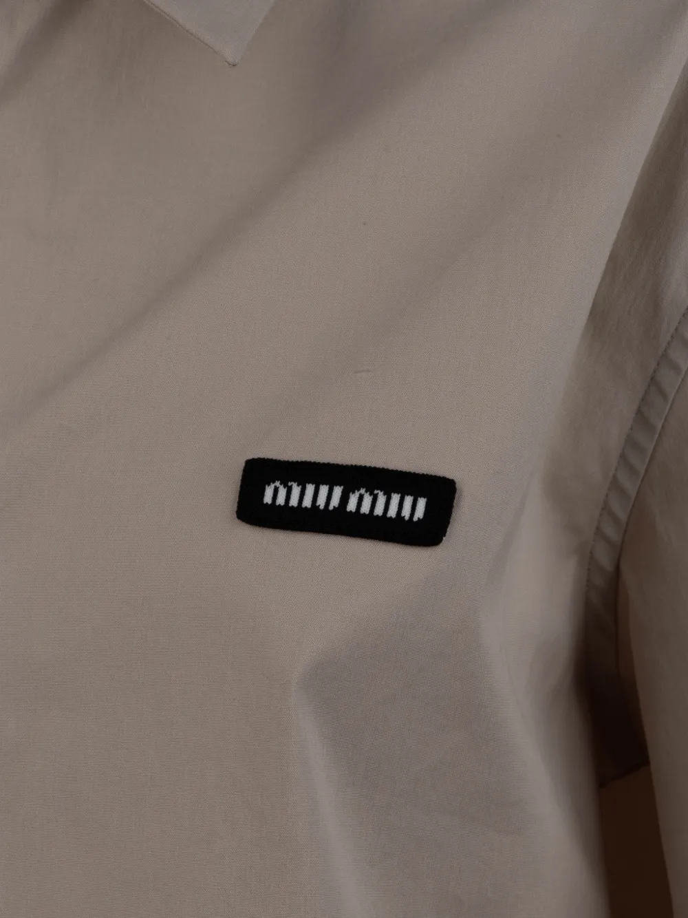 Miu Blouse met logopatch Beige
