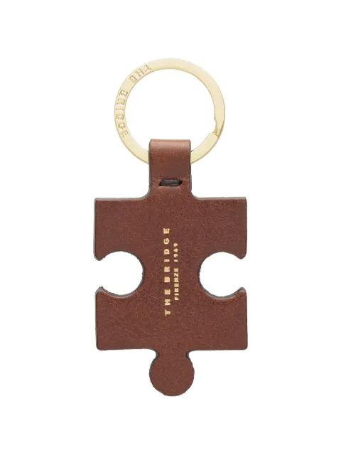 The Bridge puzzle-piece leather keyring