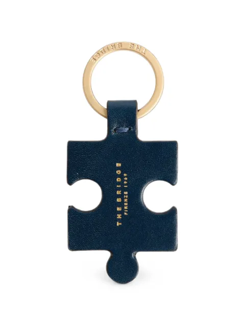 The Bridge puzzle-piece shape leather keyring