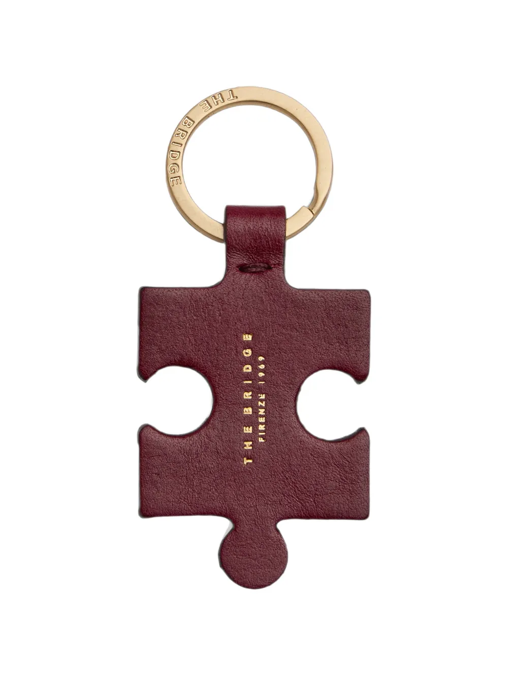 The Bridge puzzle-piece leather keyring