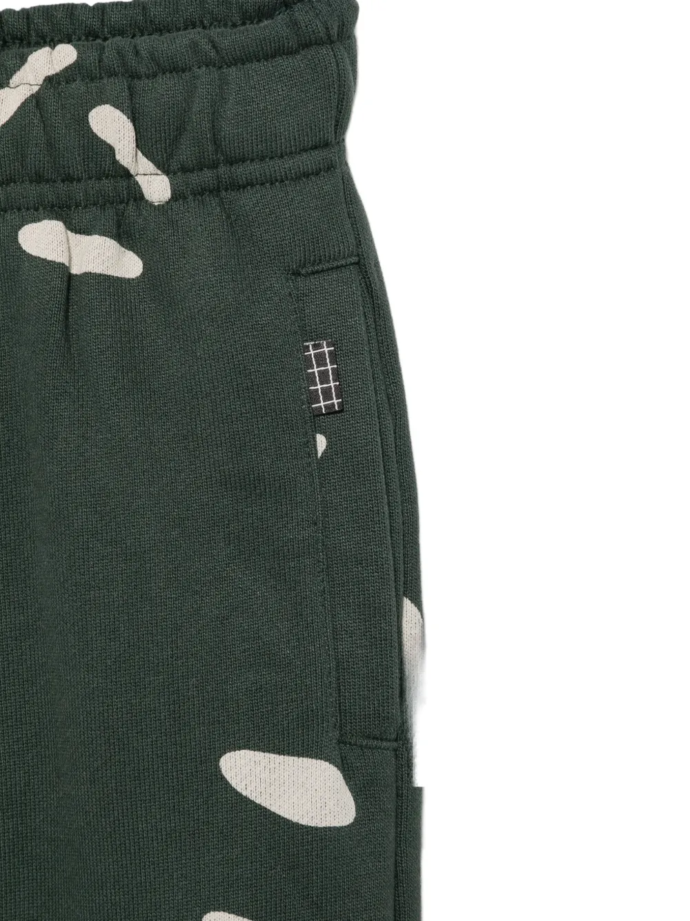 Molo Adan trainingsbroek met abstracte print Groen