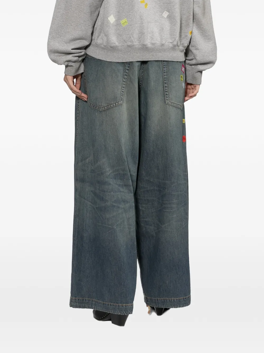 Maison MIHARA YASUHIRO Jeans met wijde pijpen en prijskaartjessticker-print Blauw