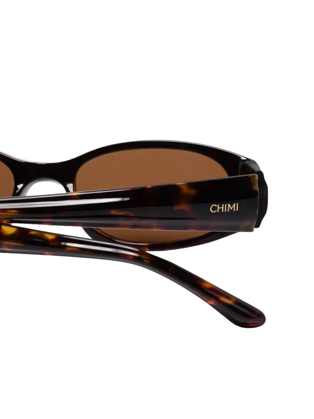 Chimi Note zonnebril met ovalen montuur Bruin