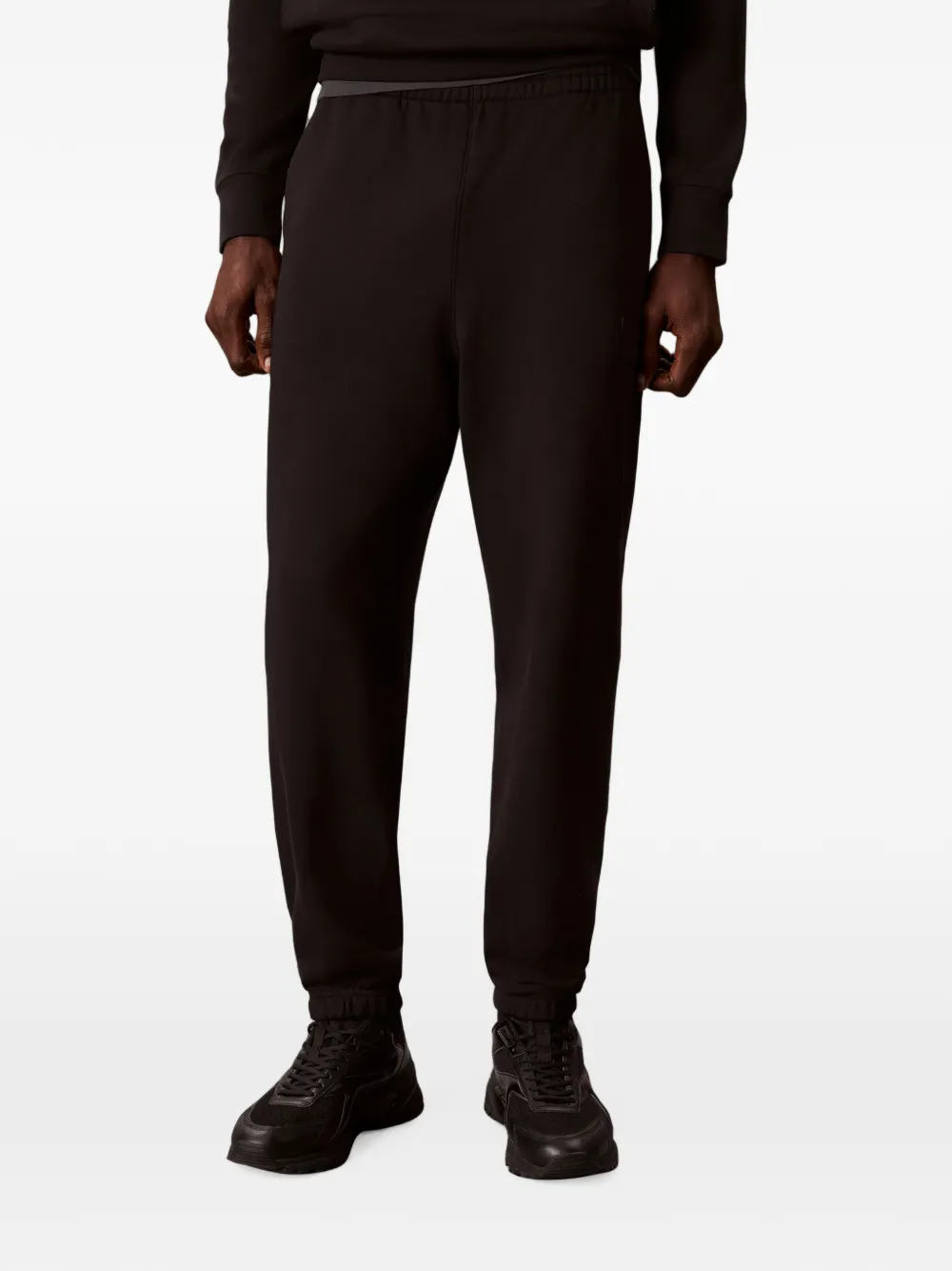 Calvin Klein logo-patch track pants Zwart