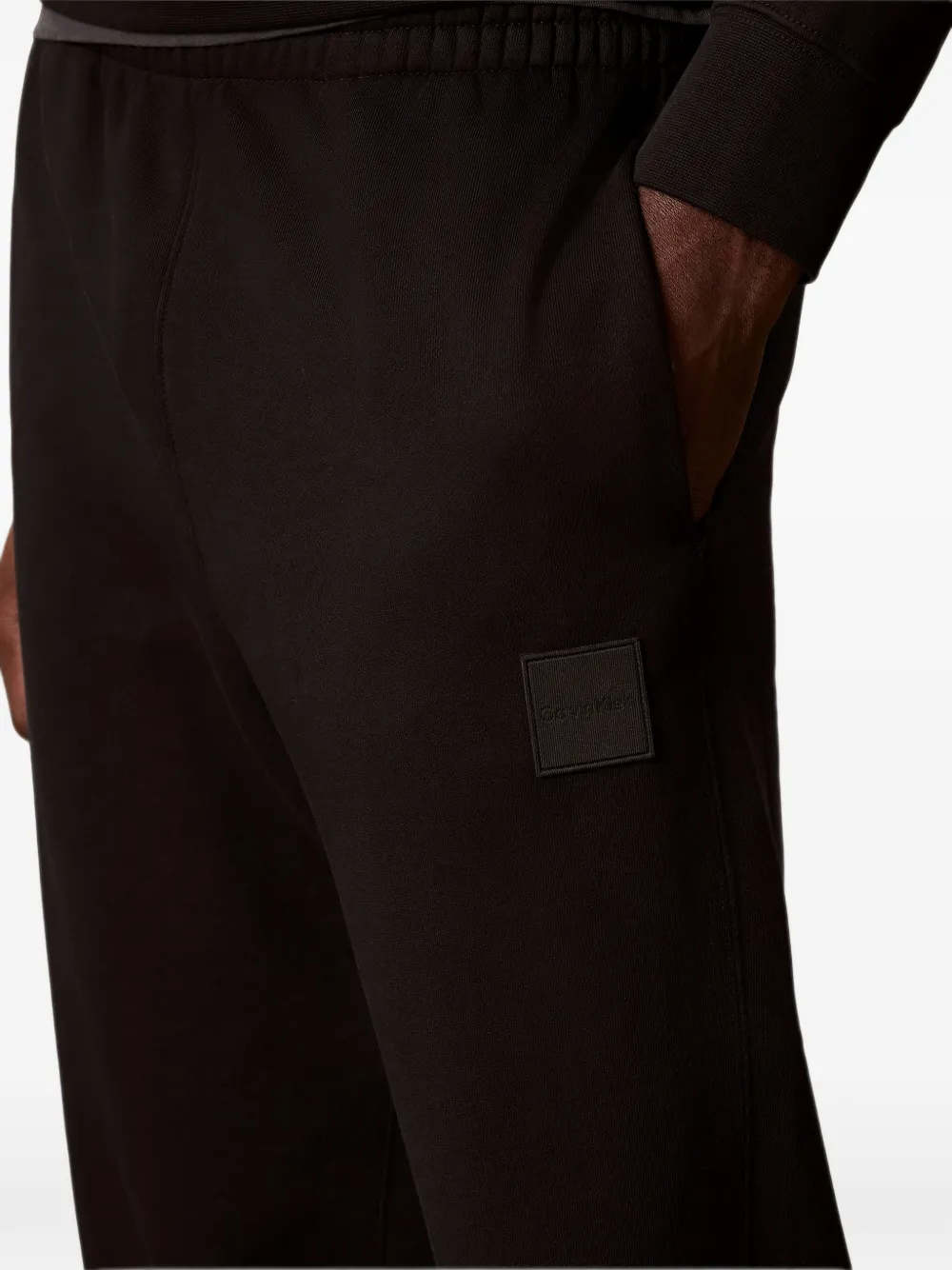 Calvin Klein logo-patch track pants Zwart