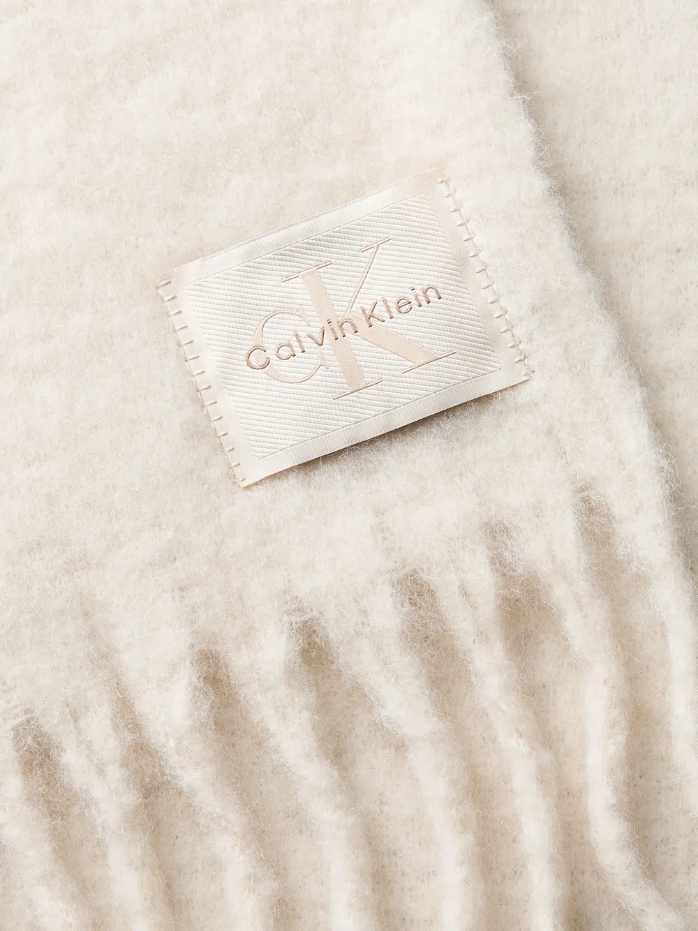 Calvin Klein logo-patch fringed scarf Beige