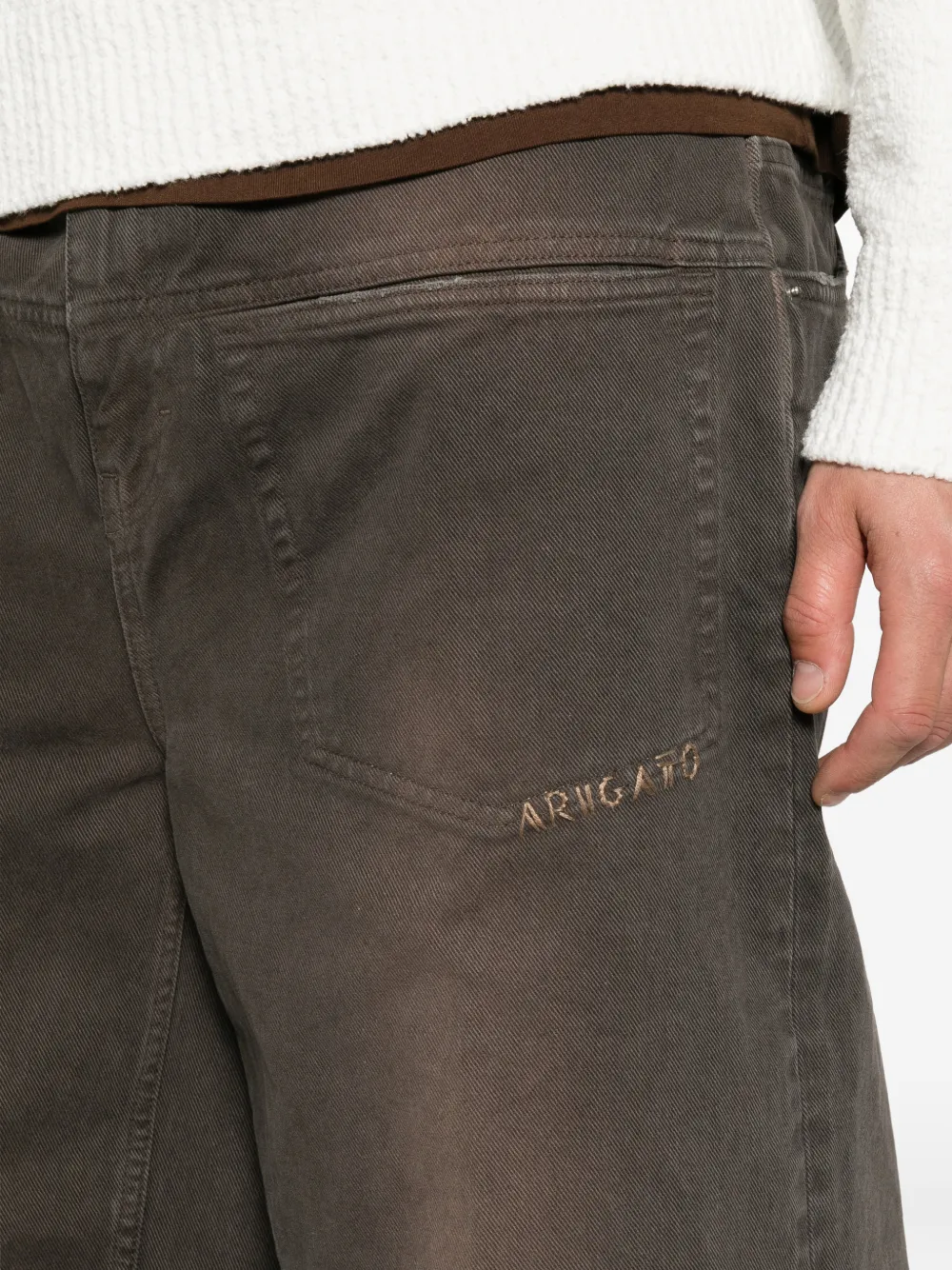 Axel Arigato Invert jeans met opgestikte zak en vervaagd effect Bruin