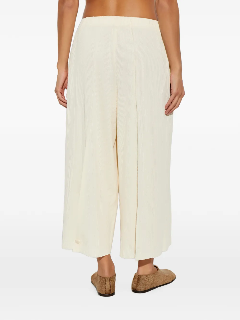 Pleats Please Issey Miyake Plooibroek met wijde pijpen Beige