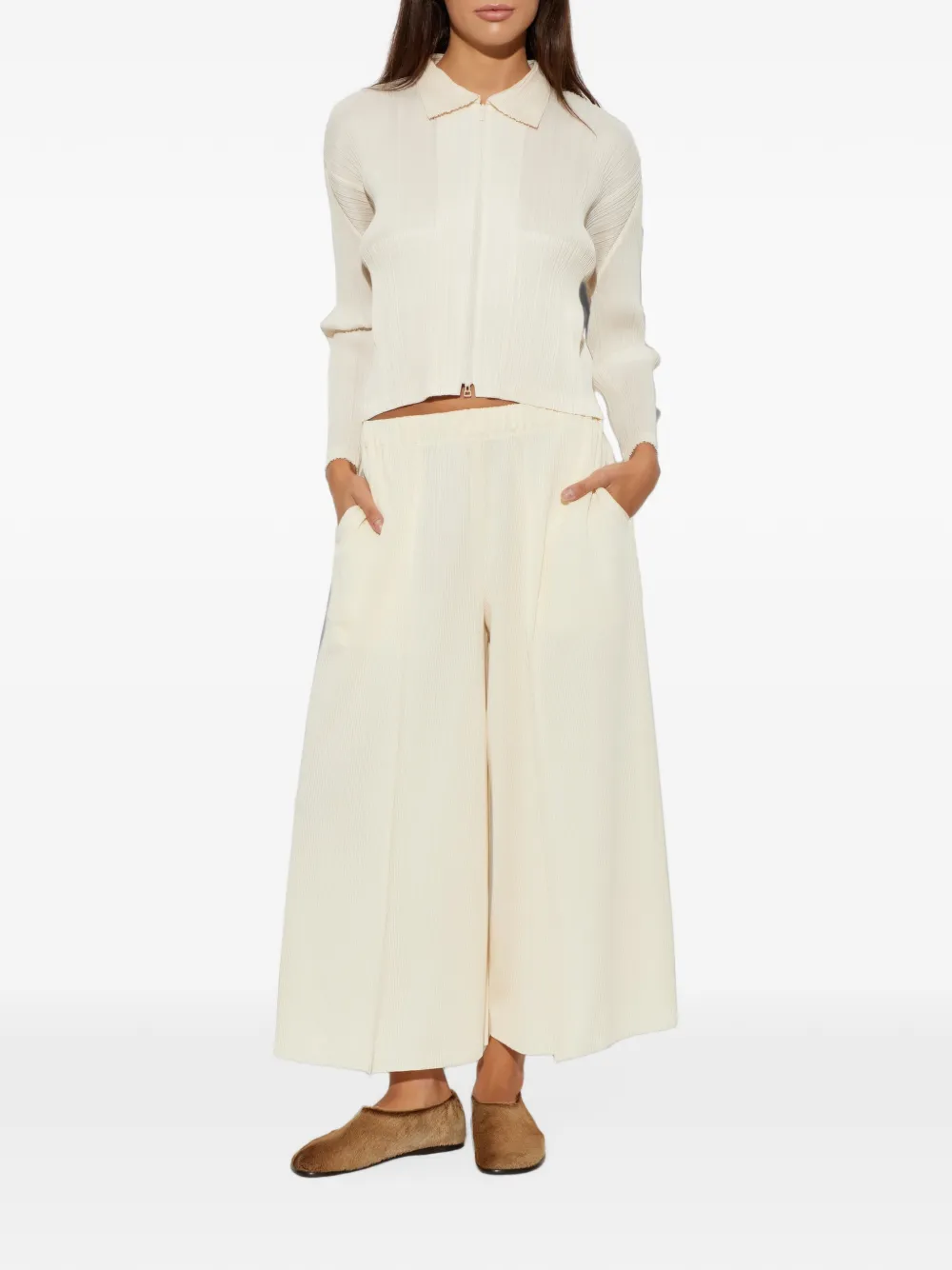 Pleats Please Issey Miyake Plooibroek met wijde pijpen Beige