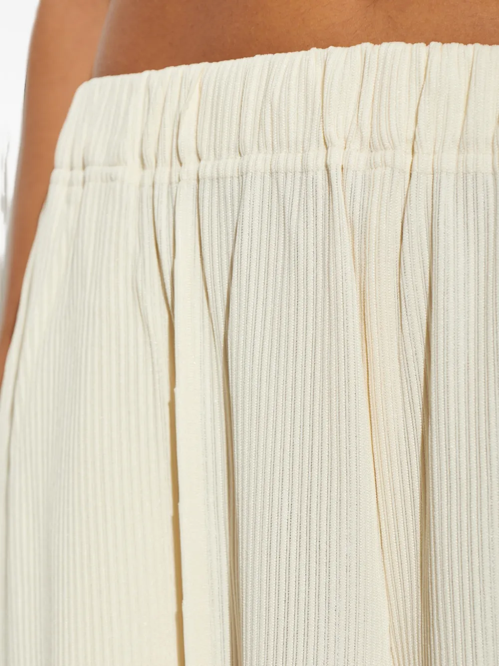Pleats Please Issey Miyake Plooibroek met wijde pijpen Beige