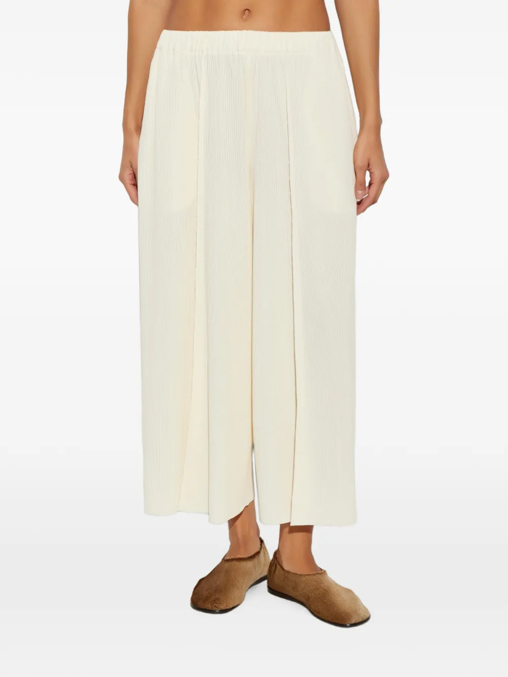 Pleats Please Issey Miyake Plooibroek met wijde pijpen Beige