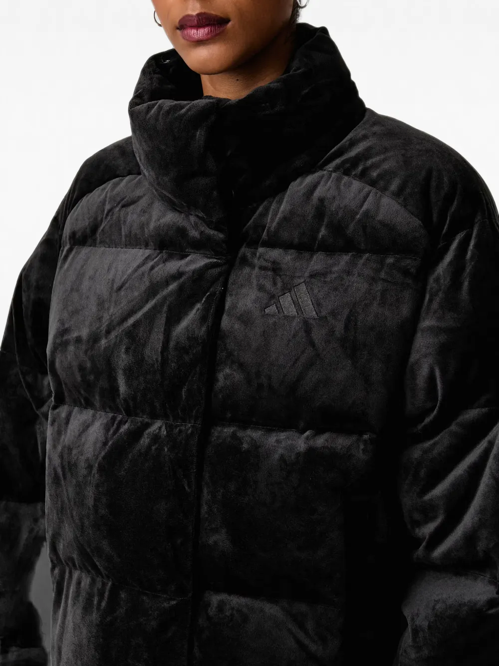 adidas Helionic quilted velour puffer jacket Zwart
