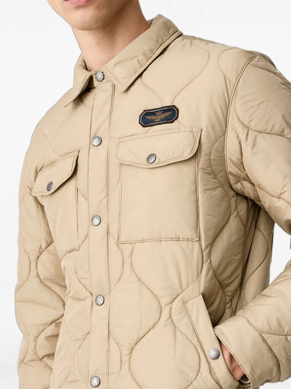 Aeronautica Militare Gewatteerd jack met logopatch Beige