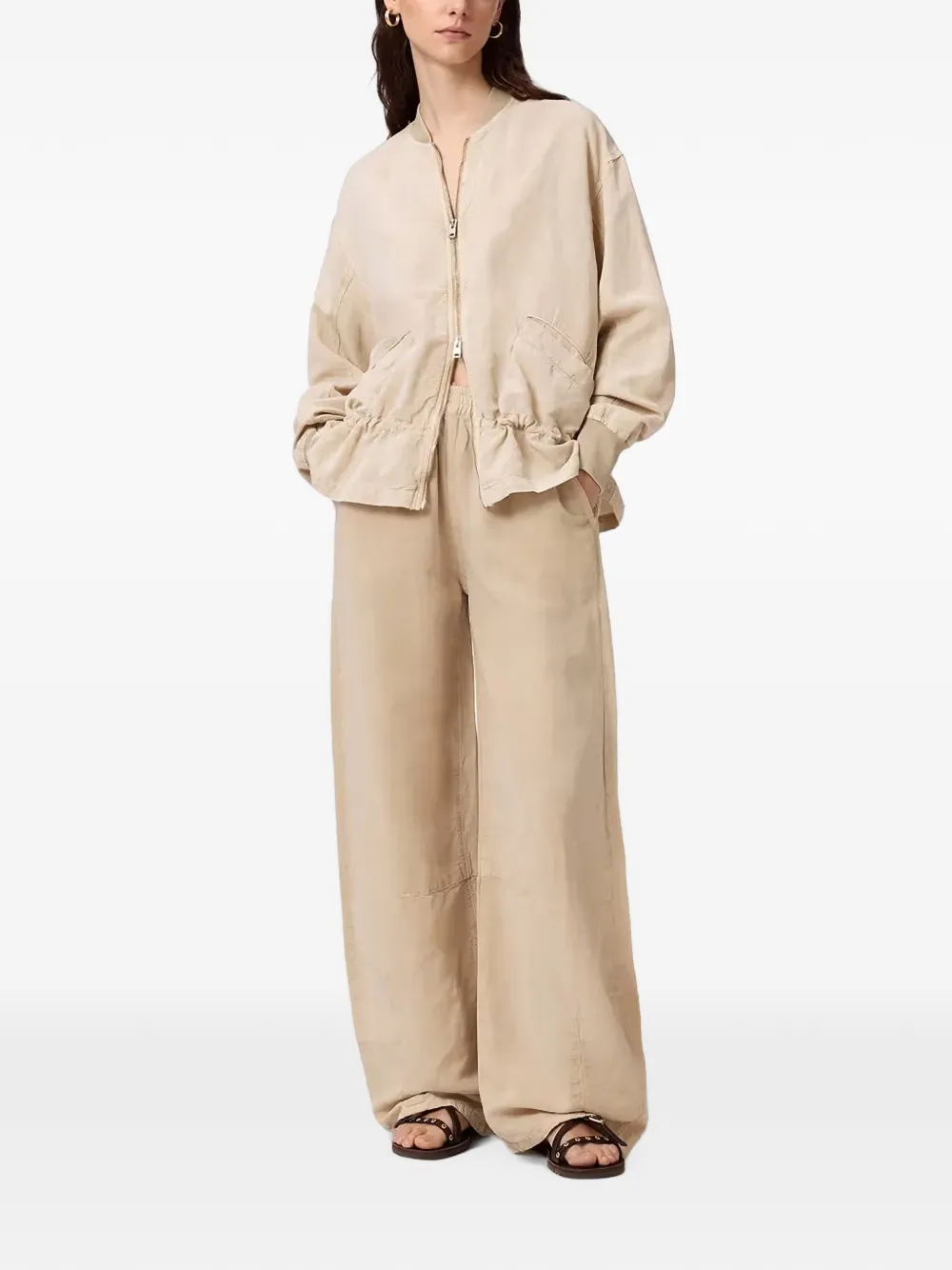 AllSaints Jet broek met elastische taille en wijde pijpen Beige
