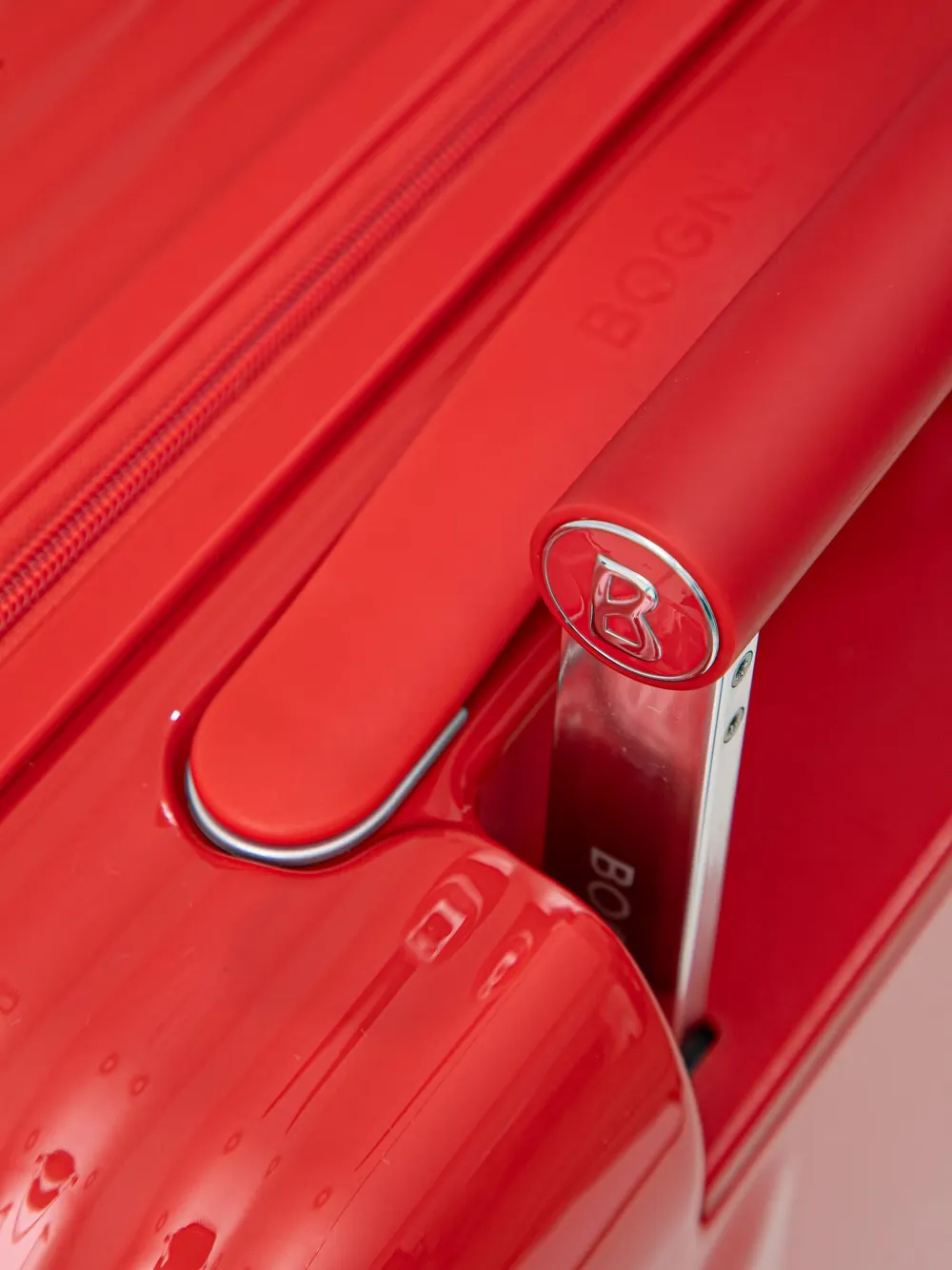 BOGNER Piz C55 logo-embossed hardshell suitcase Rood