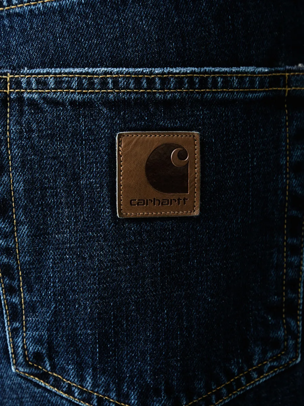 Carhartt WIP Aaron jeans met wijde pijpen en logo-patch Blauw