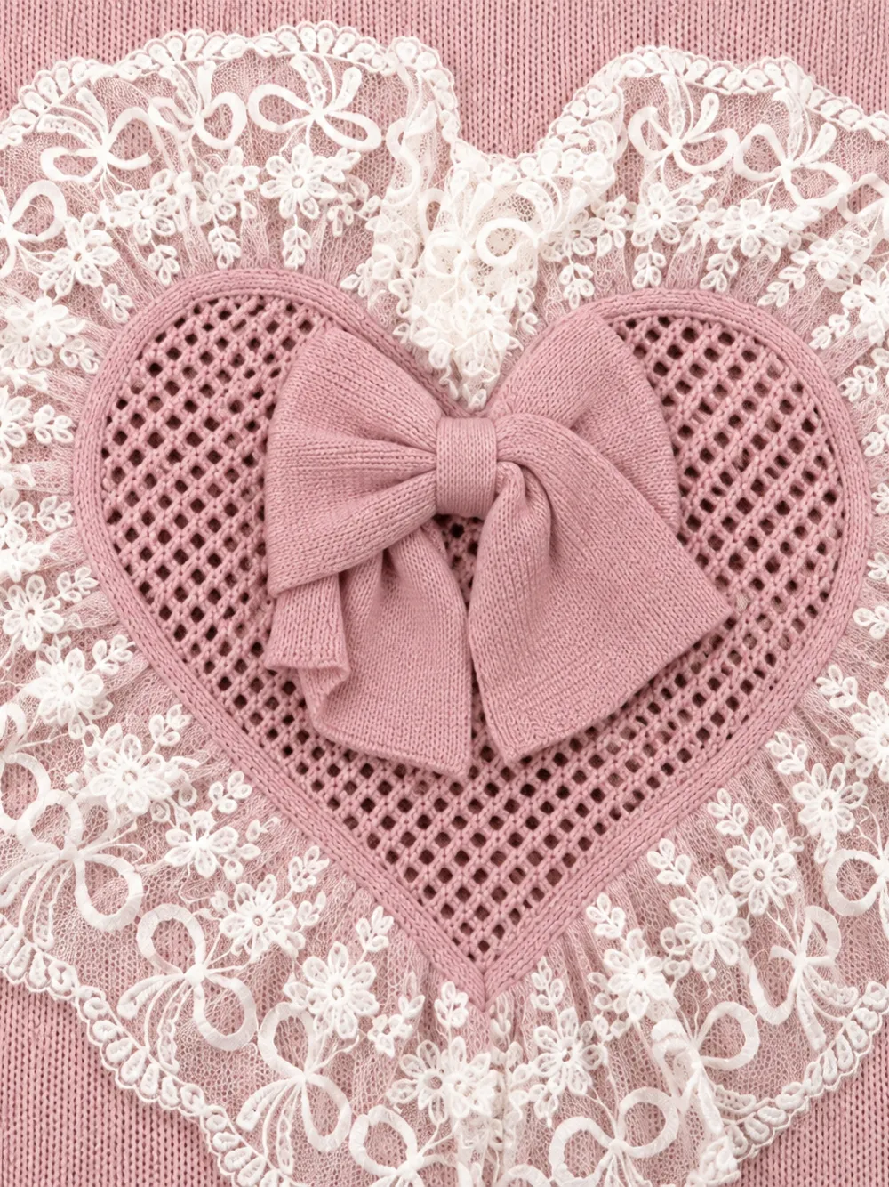 Bébé di Almy Deken met kanten afwerking en strik Roze