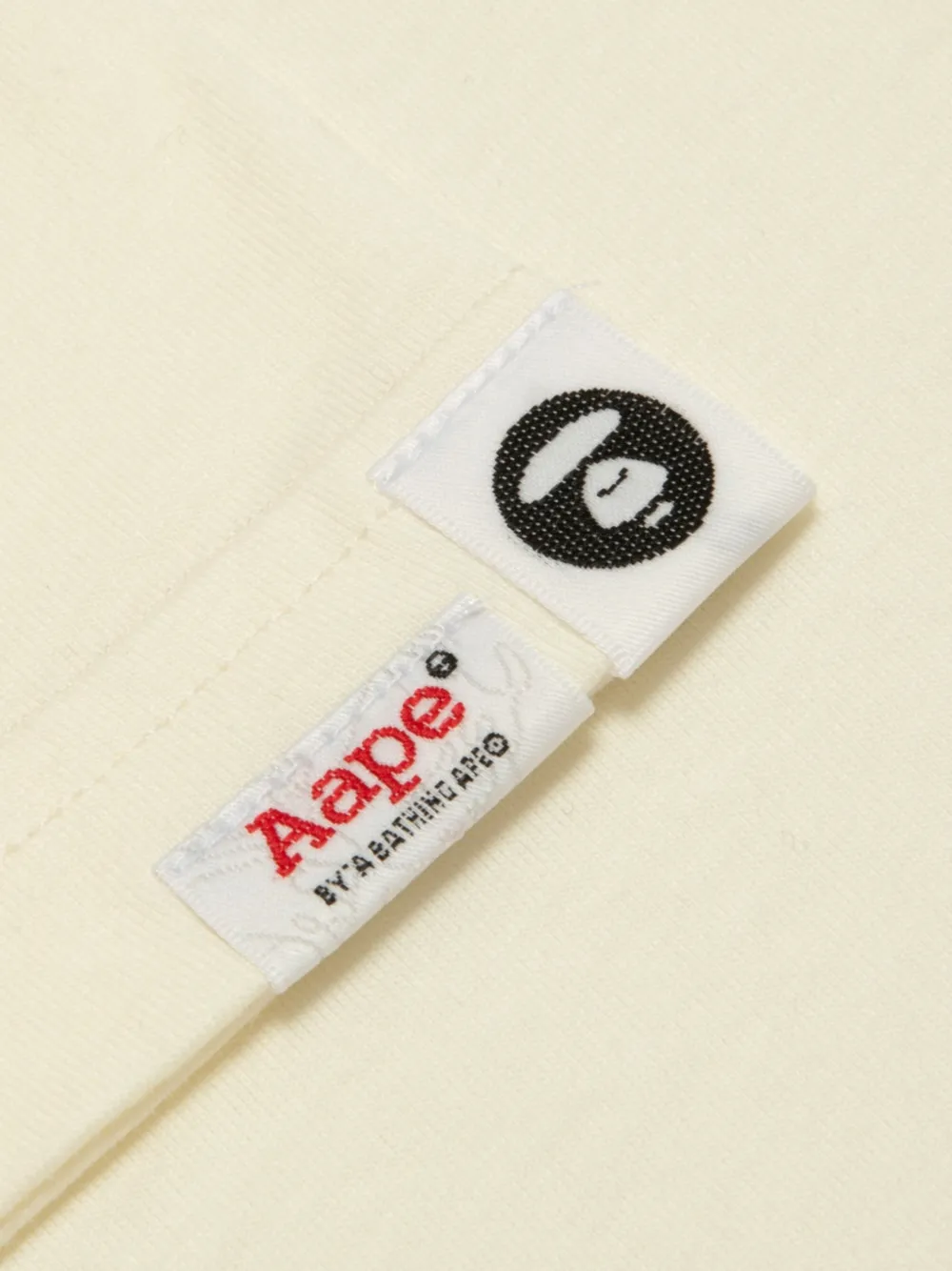 AAPE BY *A BATHING APE Alpaca katoenen T-shirt met grafische print Beige