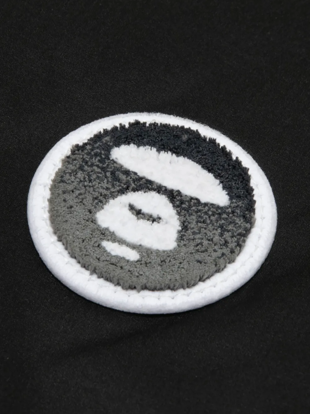 AAPE BY *A BATHING APE Gewatteerd donsjack met capuchon Zwart