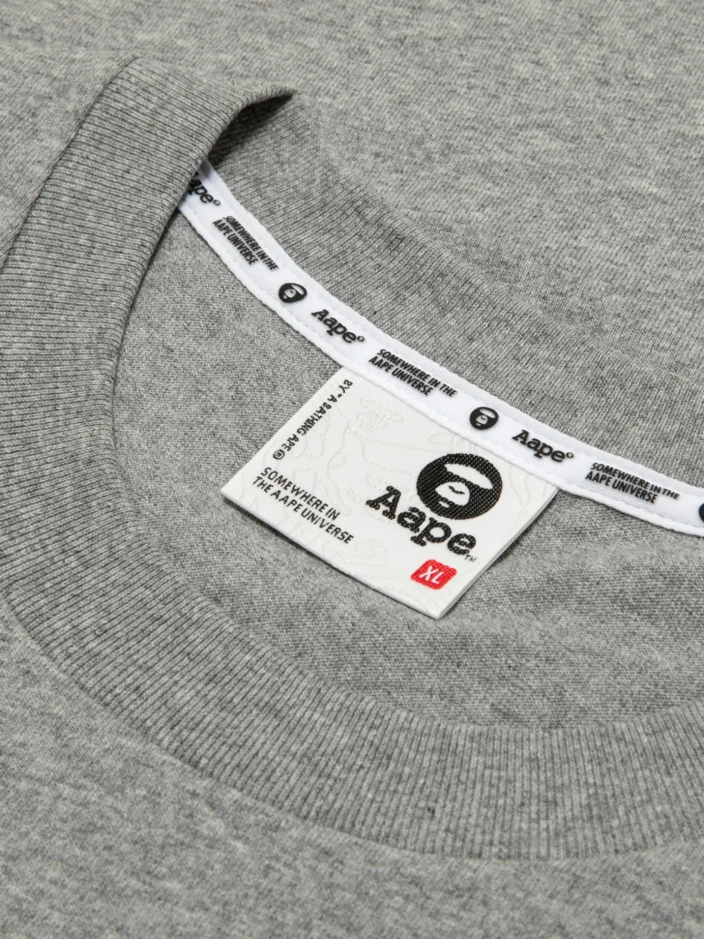 AAPE BY *A BATHING APE AAPEUNVS katoenen T-shirt met grafische print Grijs