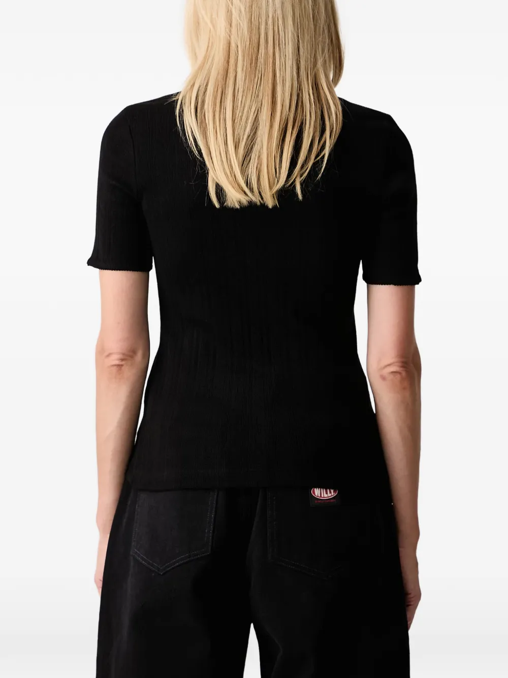 Lacoste Ribgebreid poloshirt met logo-patch Zwart