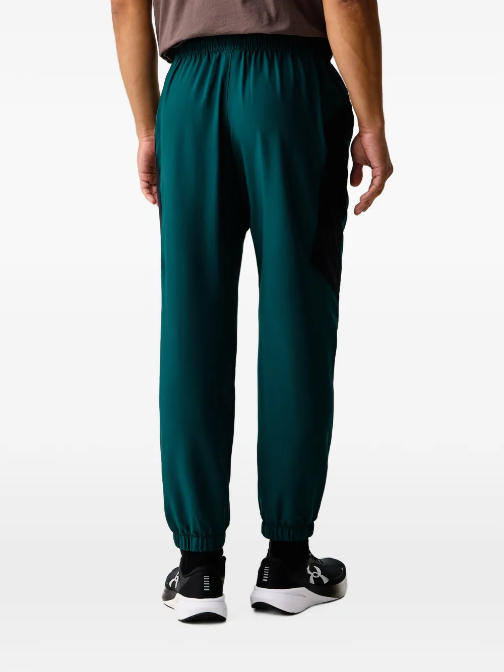Under Armour Tech TM Sport elastische trainingsbroek met logo-print Groen