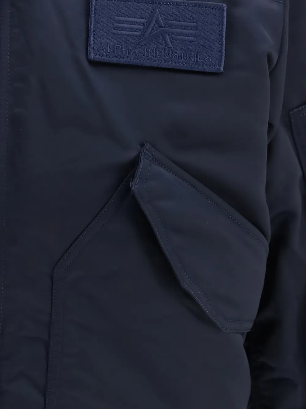 Alpha Industries Cwu-45 P bomberjack met logo-patch Blauw
