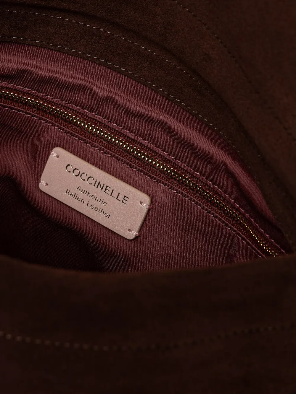 Coccinelle Kleine Lidia schoudertas met logo-reliëf Bruin