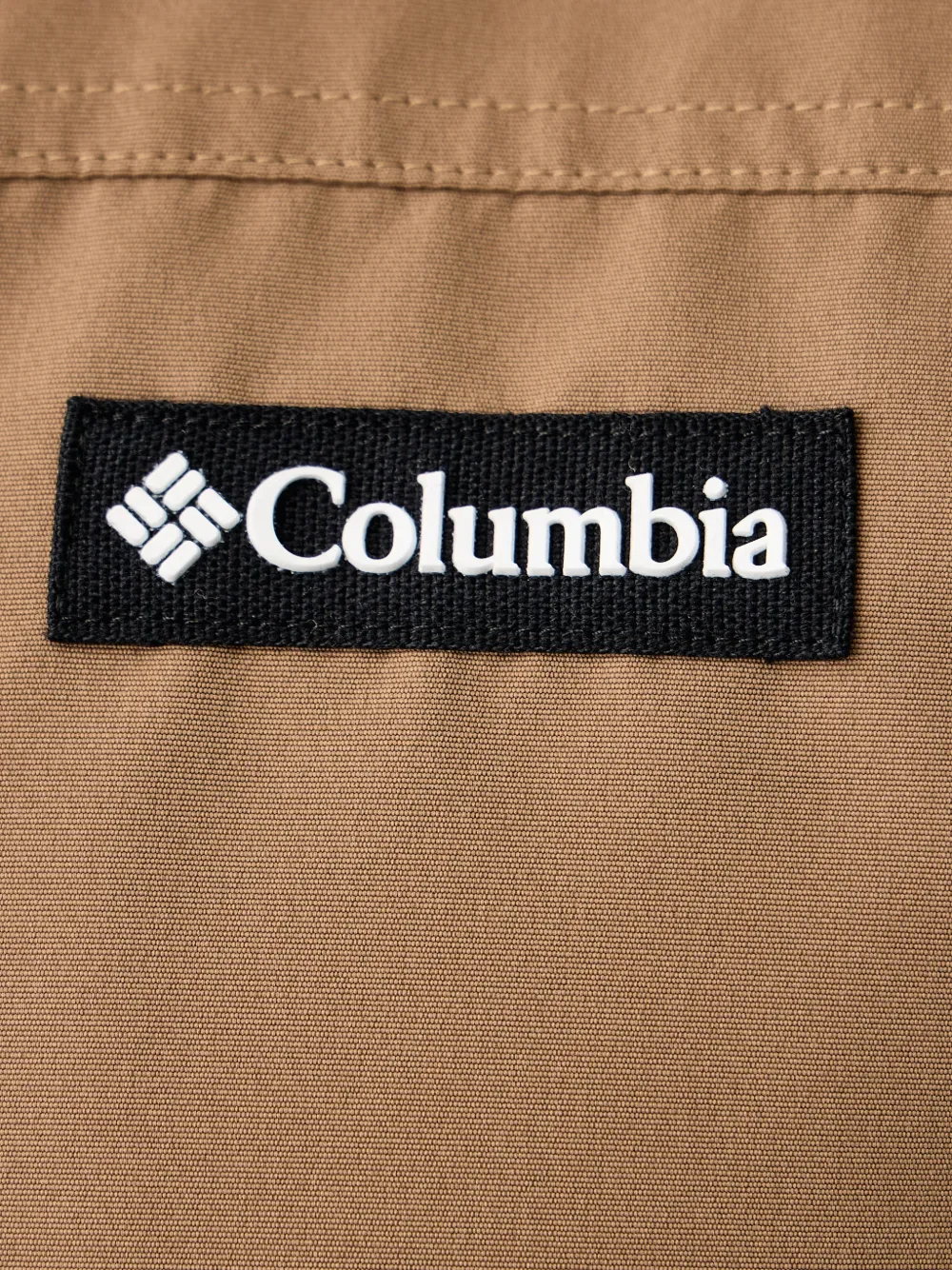 Columbia Bugaboo™ IV jack met capuchon en vlakken Beige