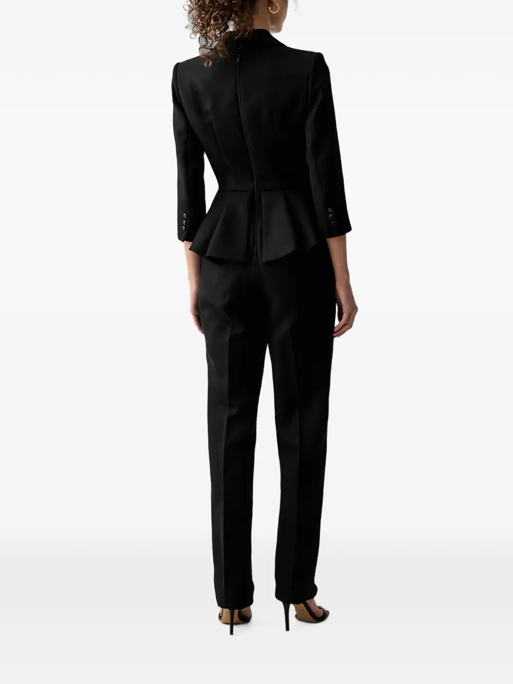 Elisabetta Franchi Jumpsuit met dubbele rij knopen en peplum-design Zwart