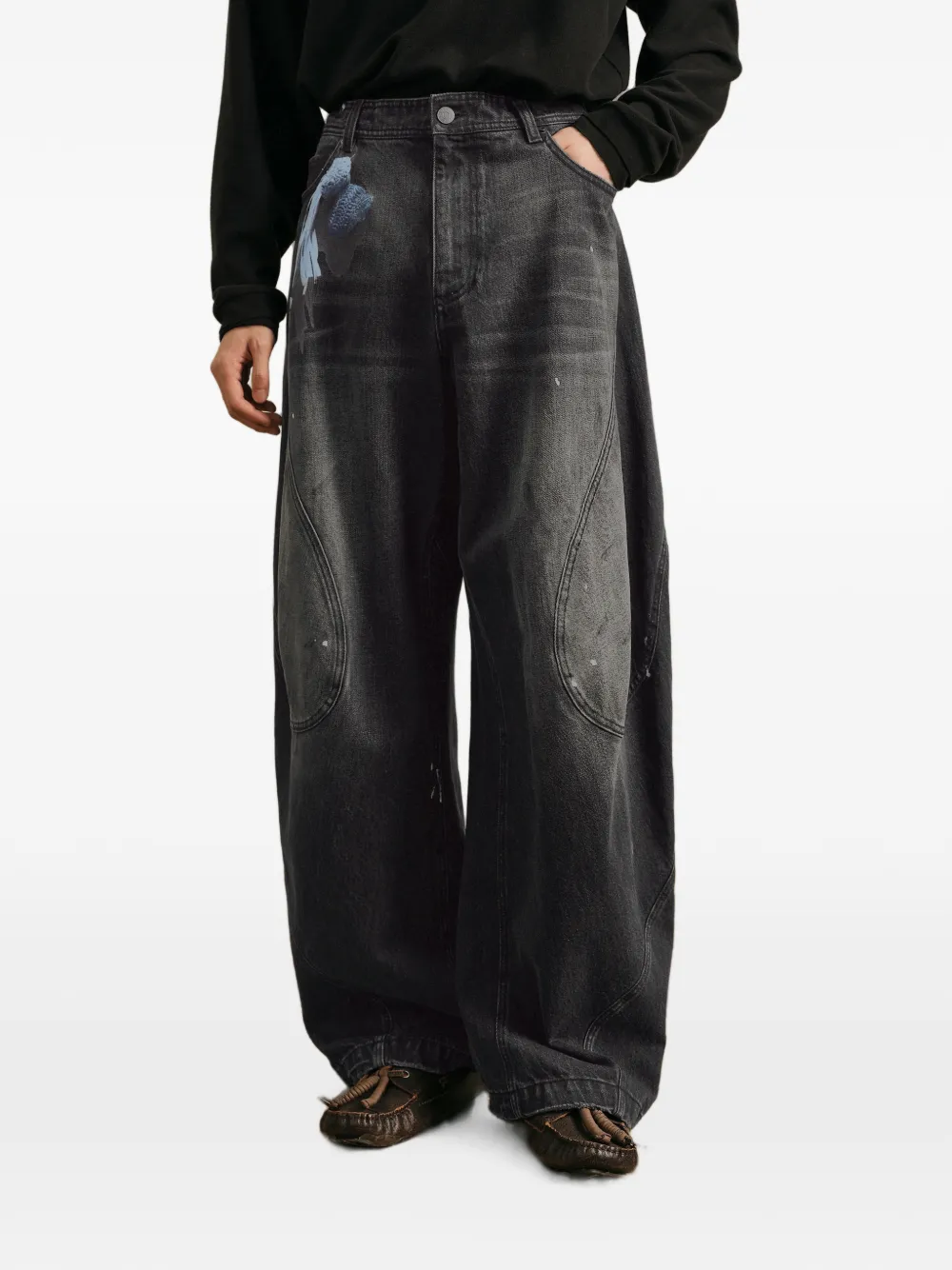 CROQUIS Sculpturale jeans met wijde pijpen en schelpvormig silhouet Zwart